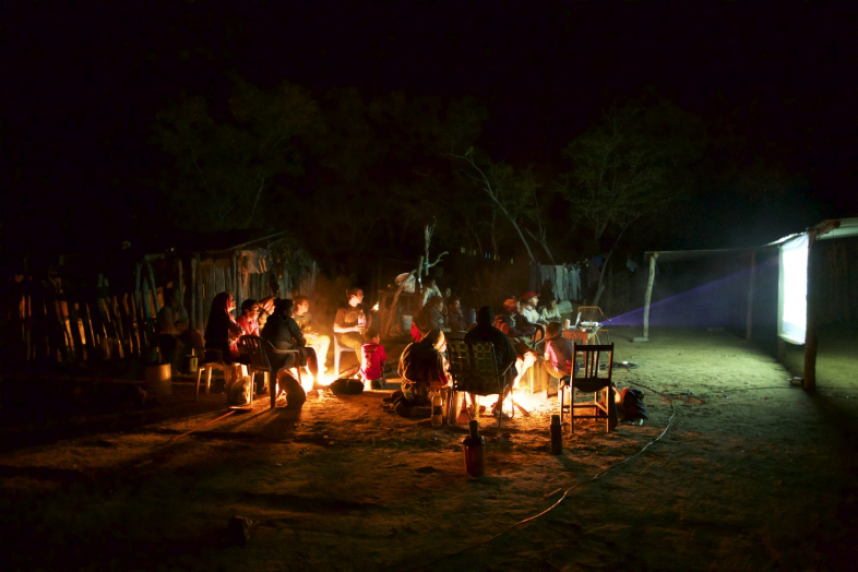 People watching film as part of the Ayoreo Video Project